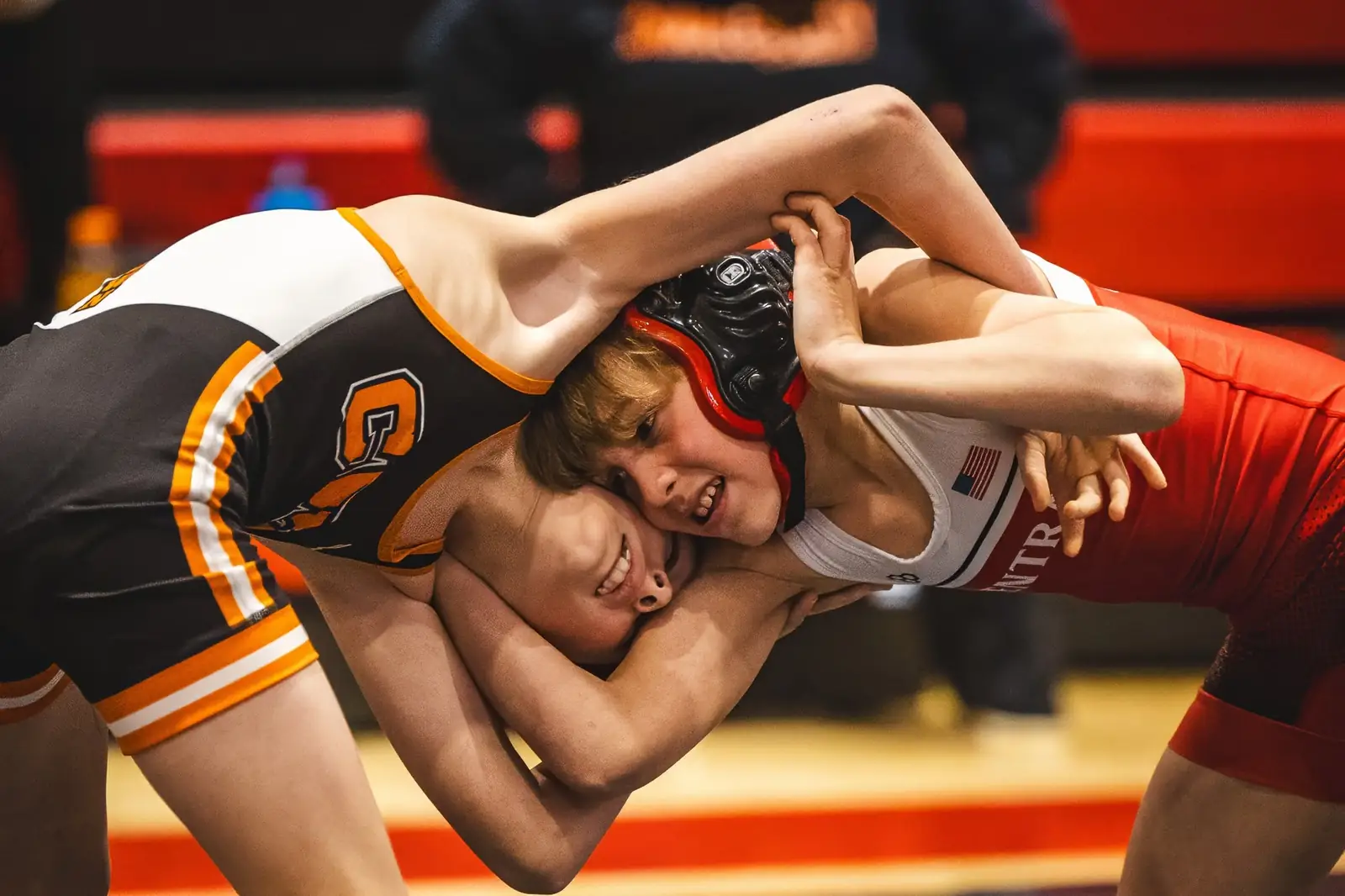 A Central wrestler tied up with his opponent at the Central Warriors Tournament